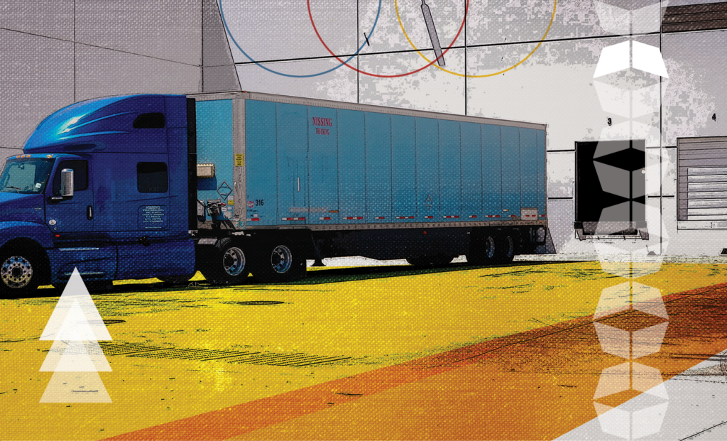 Truck outside warehouse, representing the choice between an asset-based carrier and broker