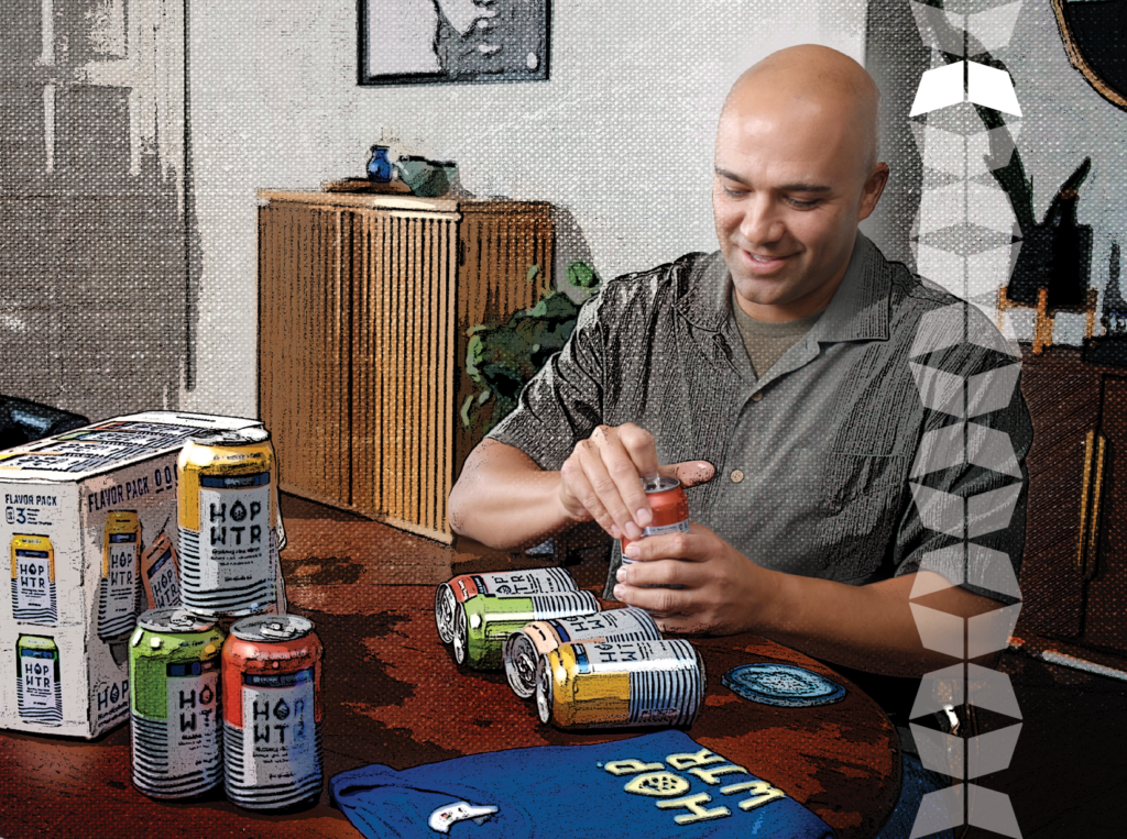 man opening a can of hopwtr