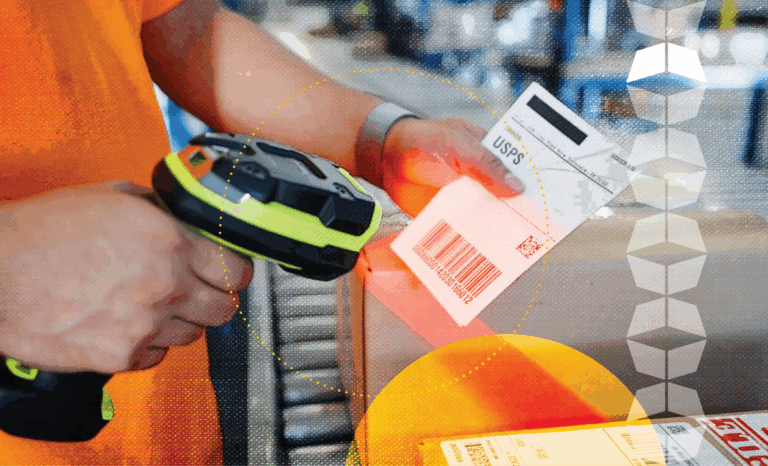 Warehouse worker scanning label for outgoing product, representing the importance of inventory accuracy