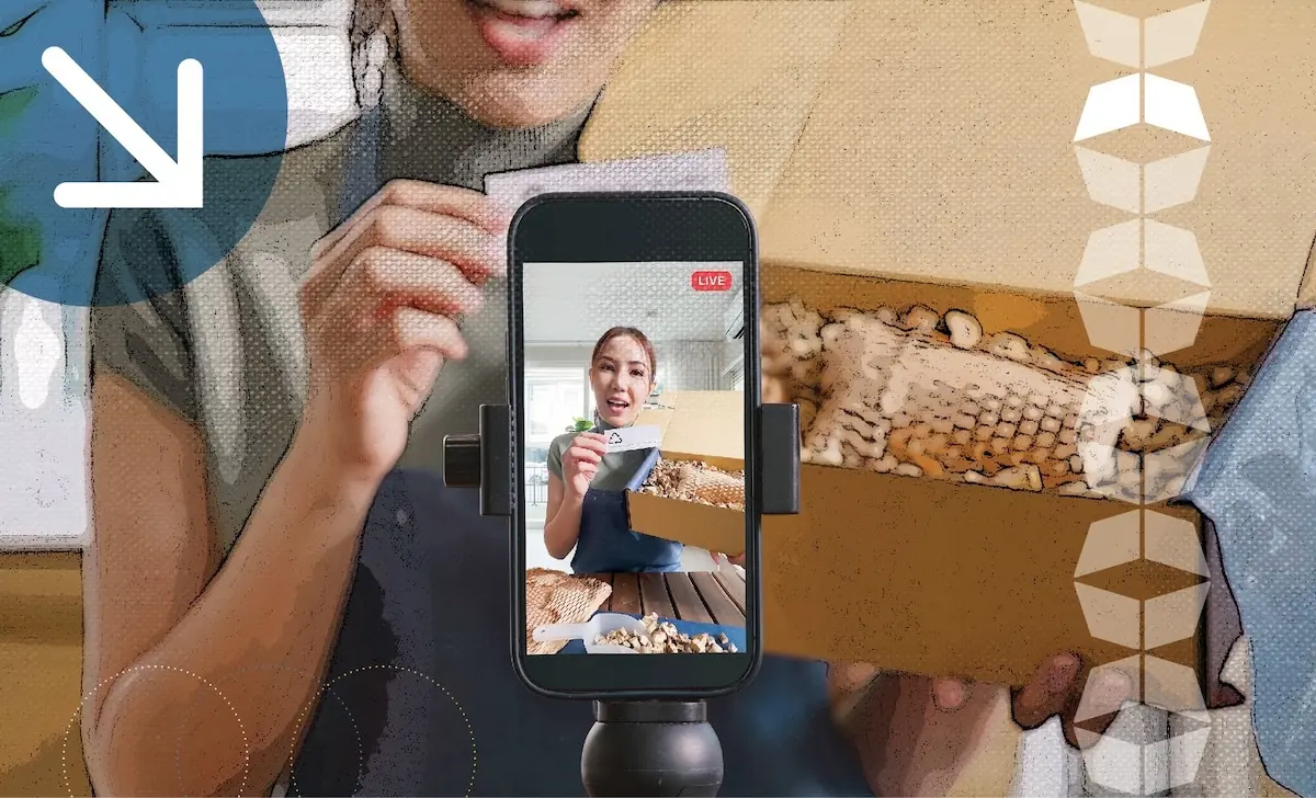 woman holding cell phone with box in background representing live shipping