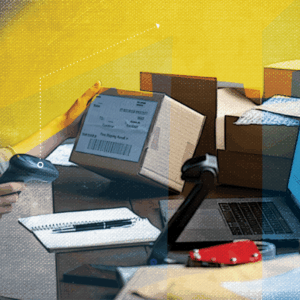 woman with multiple packages and scanner and computer, representing order splitting in logsitics operations