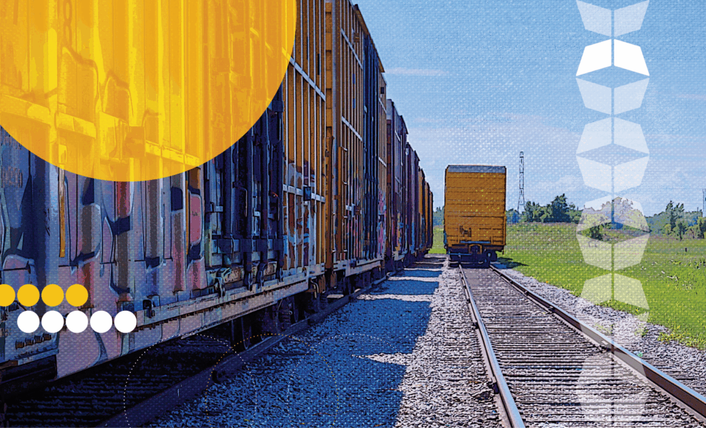 Rail cars on track, representing the importance of knowing rail terminology for when seeking rail logistics services