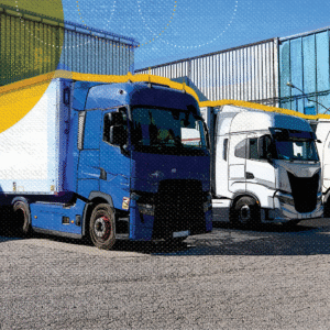 Three trucks in a container yard, representing 2026 transportation trends