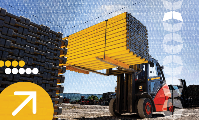 Building materials being handled by forklift, representing the importance of construction logistics.