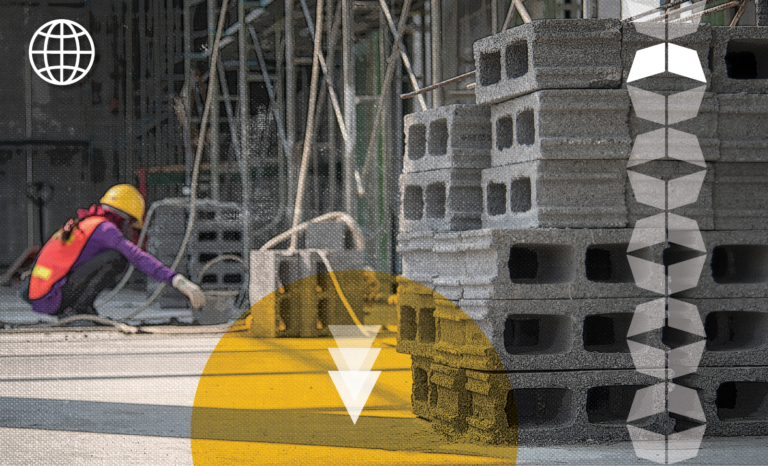 Worker in warehouse with construction materials, representing disruption in construction supply chains