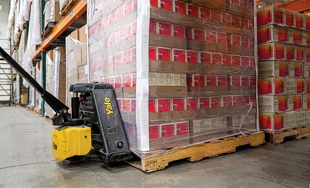 Forklift with stacked food boxes