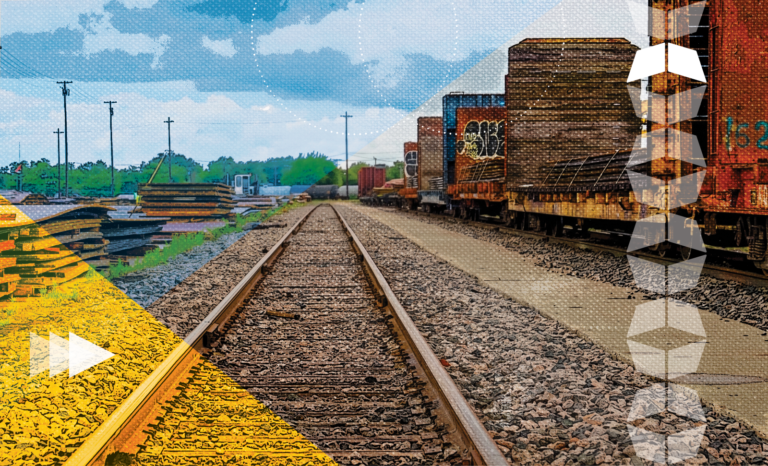 Tracks with train cars, representing the current state of rail freight