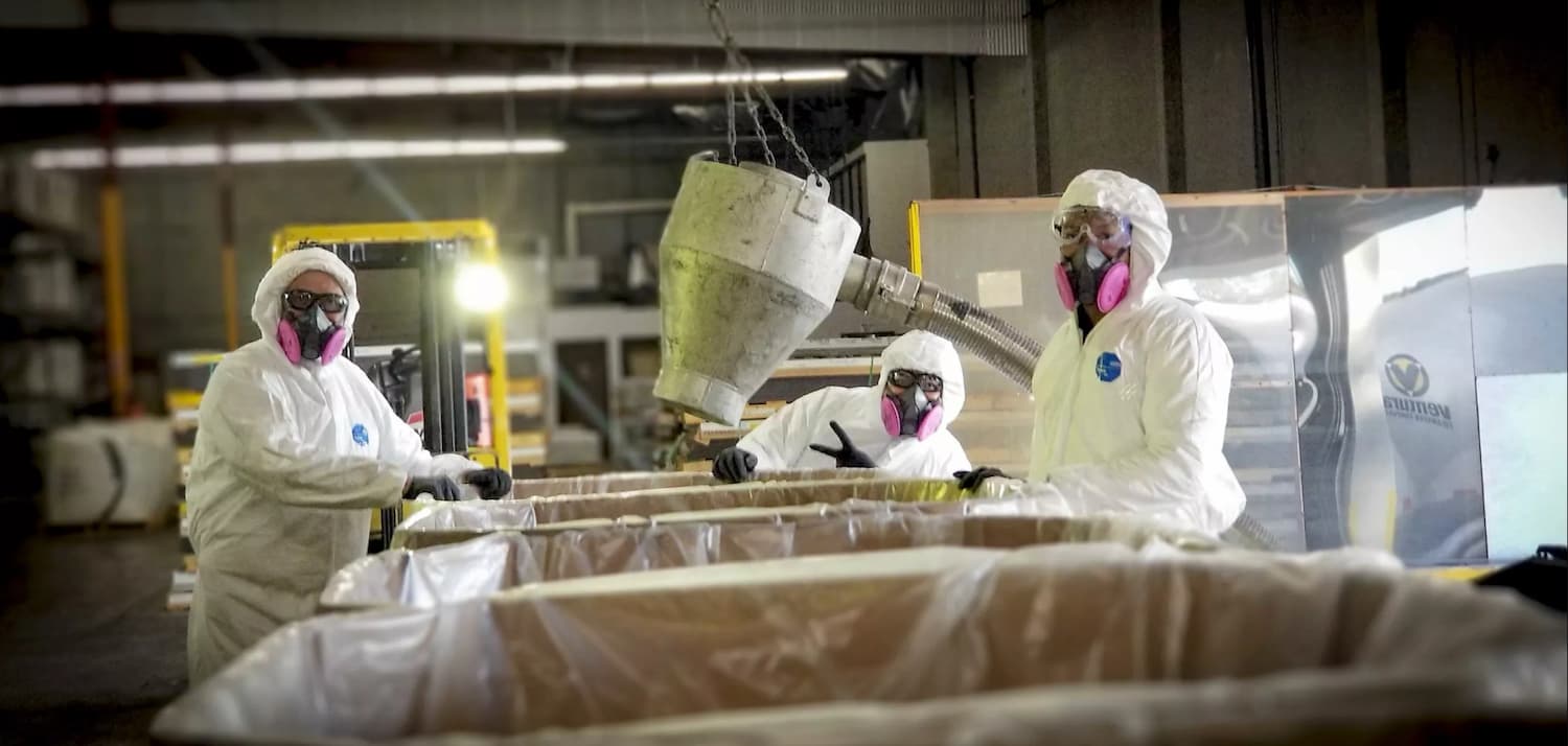 Lab workers packaging food products in boxes