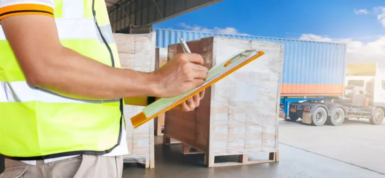 unloading shipping container from semi truck in WSI warehouse