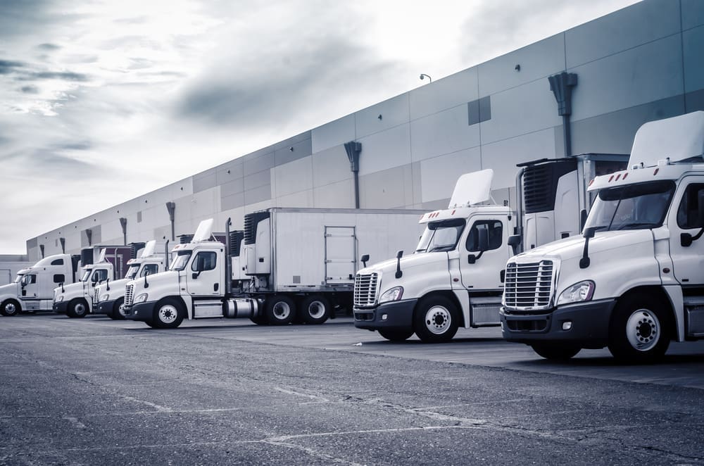 Semi trucks parked in loading dock
