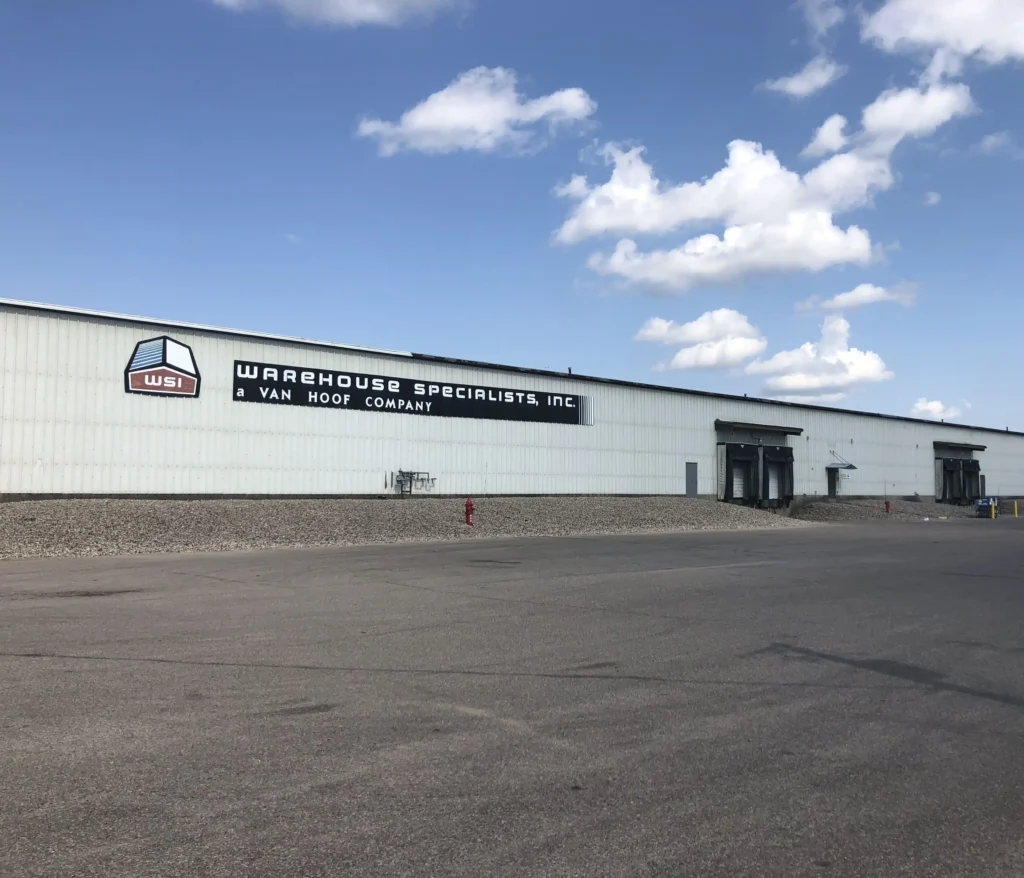 Large warehouse with clear blue sky